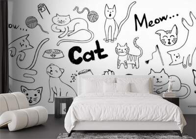 a set of doodles with cats and accessories. Black contours of stylized kittens Wall mural