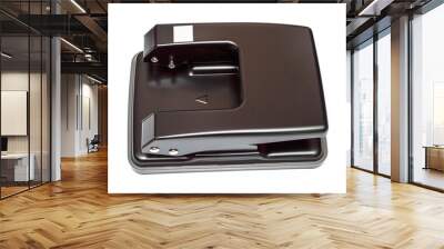 Black office hole punch on white background. Top view Wall mural