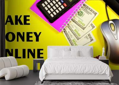 Earn money online-text lettering on the background of office supplies on the Manager's Desk. Computer keyboard, accountant's folder with documents, money, calculator, pen for writing. Wall mural