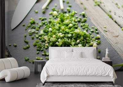 Green chopped onion on a board Wall mural