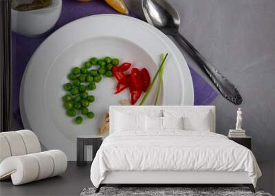 Diet soup made from fresh vegetables and chicken breast. Fo bo. Green peas chives and chili peppers. Wall mural