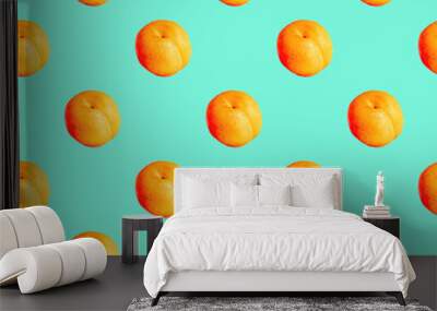 Seamless pattern with apricots on a green background. Minimal isometric texture of food. Use for boards, print on fabric. Wall mural