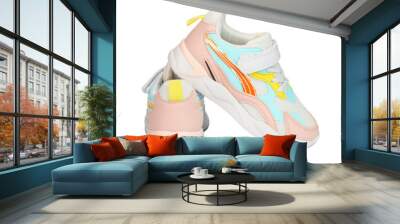 children's bright sports sneakers on a white isolated background Wall mural