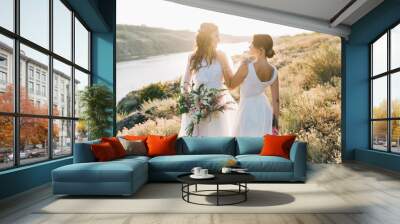 Lesbian wedding couple in white dresses Wall mural