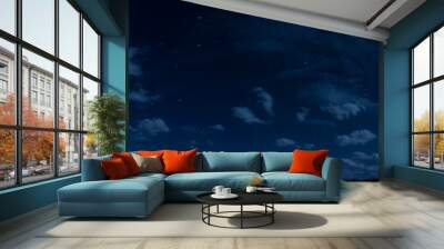 Panorama of night sky with clouds and stars. Moonlight. Wall mural