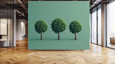 Three trees with a uniform green canopy and brown trunks, set against a plain green background Wall mural