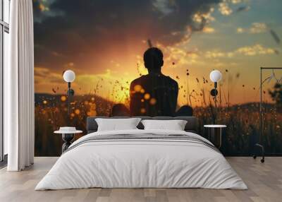 Silhouette figure enjoying the evening outdoors Wall mural