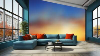 Beautiful vector background, natural phenomenon, brownish orange sunset or dawn, blue sky, blur, haze, clouds, sun. Wall mural