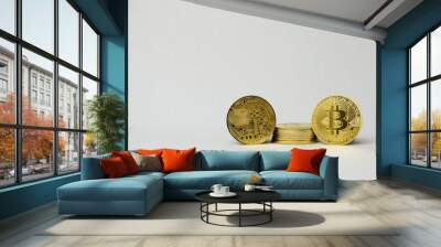 Gold bitcoin on white background. Wall mural