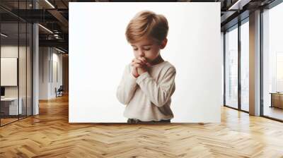 Little child praying hope Isolated on white background Wall mural