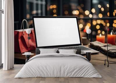 Laptop with a white screen mock up on table in the office at the mall of Christmas decor with bags, shopping bags, packages, Black Friday,.  Wall mural