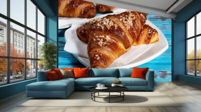 fresh croissant on a plate for breakfast Wall mural