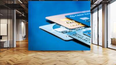 close-up of  credit cards on a dark blue background Wall mural