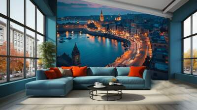 Aerial view of Gzira at night with glittering city lights and busy roads, Wall mural