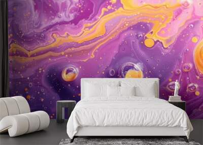 Purple and yellow soap bubbles in paint create an abstract design suitable for a colorful background. Wall mural