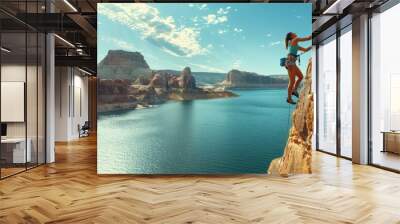 Woman rock climbing up cliff, Lake Powell, Utah, USA Wall mural