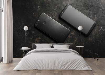 touch phone on a dark background Wall mural