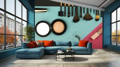 colorful flat lay with makeup brushes and products. Wall mural