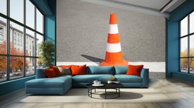 striped cone on the pavement Wall mural