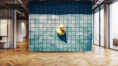 yellow rubber duck swims in the pool, top view. Dramatic mood Wall mural