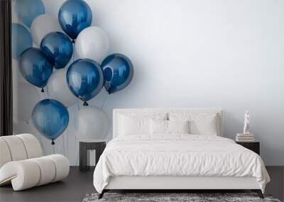 A cluster of vibrant blue balloons floating gracefully against a clean white background Wall mural