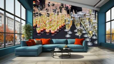 Glasses of champagne on the table with shallow depth of field Wall mural