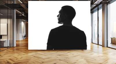 silhouette of man from behind on a white background looks away Wall mural