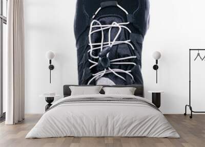 Black sneaker on a white background top view. Wall mural