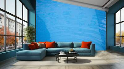 Swimming pool with blue tiles and clear water Wall mural