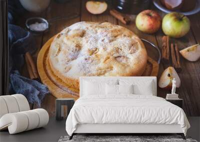 Apple pie for breakfast on a wooden table. Apple pie for breakfast. View from above. Close-up Wall mural