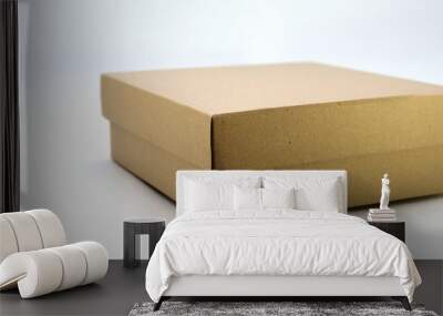 cardboard box with lid lies on white background in different angles Wall mural