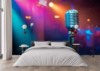 Close up retro microphone with musician playing acoustic guitar on band in night concert background Wall mural