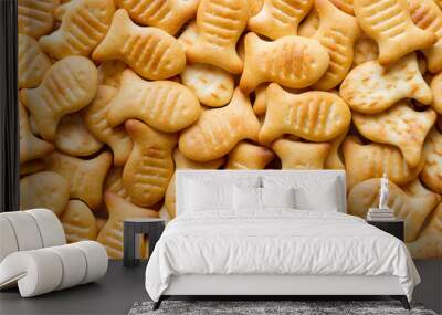 Lots of salty cookies in the shape of fish. The texture of the biscuits is the top view. Wall mural