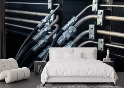 High pressure hydraulic hose system connected to steel pipes, close-up. Marine hydraulics. Wall mural