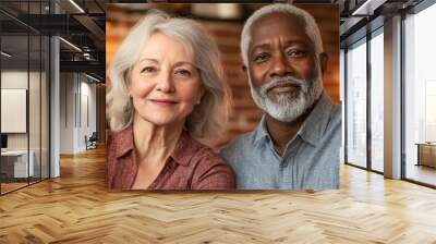 Elderly couple smiling in a cozy cafe environment Wall mural