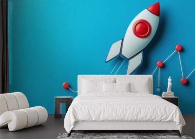 Rocket and graph on a blue background business financial startup Wall mural