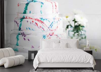 Amazing Wedding cake with decoration on white wooden table Wall mural