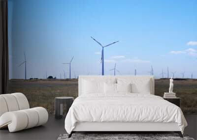 wind farm in the steppe against the blue sky Wall mural