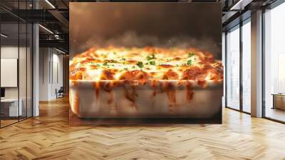 A delicious baked lasagna fresh out of the oven, served in a white ceramic dish with melted cheese and herbs Wall mural