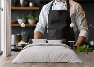 Man wearing black apron mock up in the modern kitchen, chef uniform for cooking	 Wall mural