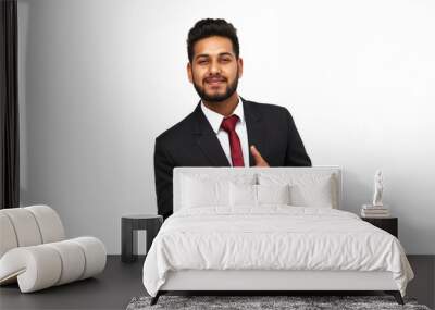 Portrait of young happy indian business man on white isolated background looking to the camera. Wall mural