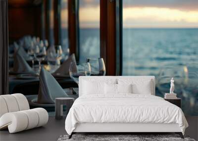 Elegant dining room set for a gourmet meal on a luxury cruise ship with a serene ocean view at sunset Wall mural