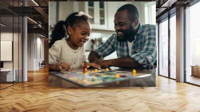 Father and daughter are laughing and enjoying their time together while playing a board game at their kitchen table Wall mural