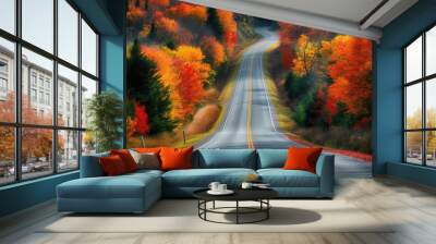 Scenic drive winding through a forest displaying the colorful foliage of autumn Wall mural