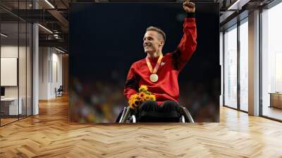 Paralympian in a wheelchair during the competition. Inclusive sport for people with special needs Wall mural