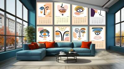 Wall vertical calendar for 2021, the week starts on Sunday. Template A4 format calendar set of month with cut out shapes, abstracts forms. Collection of line faces, eyes posters. Vector illustration. Wall mural