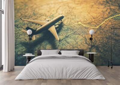 Airplane on map highlighting travel route Wall mural