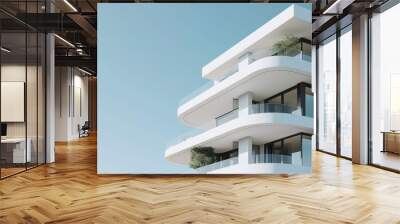 Minimalist white modern architecture with sweeping balconies and clean lines against a clear sky Wall mural