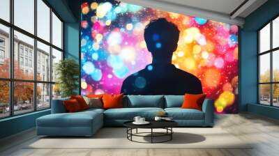 Silhouette of person against colorful bokeh lights background Wall mural