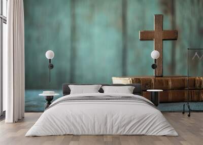 Wooden cross on two old books wooden surface Wall mural